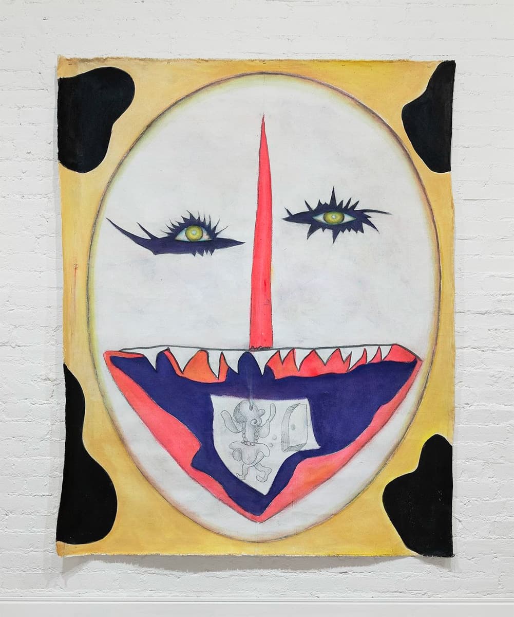 A bold, surreal depiction of an oval-shaped face with exaggerated features. The face has sharp, cat-like eyes, a long red nose, and a wide mouth filled with jagged teeth. Inside the mouth is a detailed drawing of a small creature or demon, adding a layer of bizarre detail. The face is framed by an off-white background with abstract black spots.