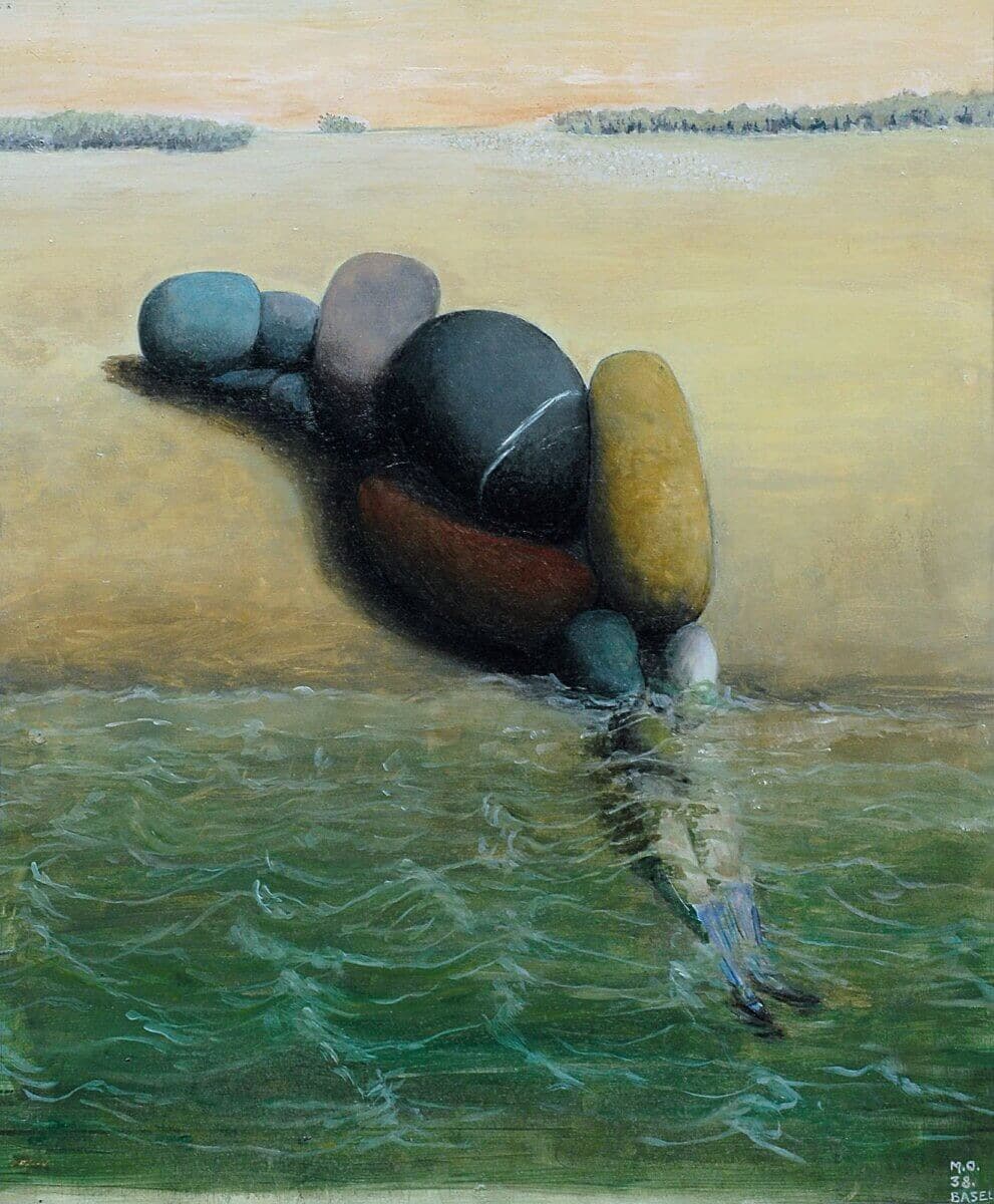 A surreal painting of a woman’s form made from rounded, multicolored stones, partially submerged in water, with a calm shoreline and horizon in the distance.