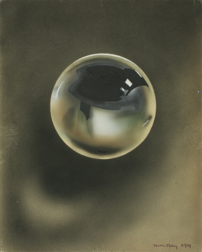 A single glass sphere floating against a dark, softly blurred background, reflecting light and shadow like a distorted interior room, creating a surreal, dreamlike atmosphere.