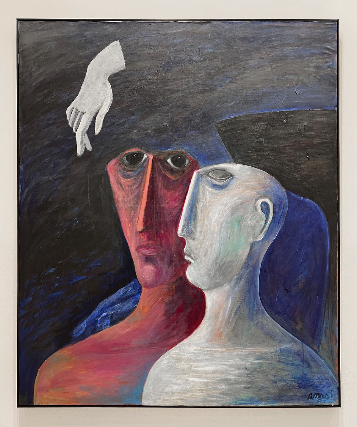 An abstract painting featuring two human-like figures with elongated, stylized faces. The left figure is painted in dark reds and browns with hollow, intense eyes, while the right figure is lighter in color, almost ghostly, with a pale blue and white complexion. Above them, a white hand floats against a dark background, adding a sense of mystery or surrealism.